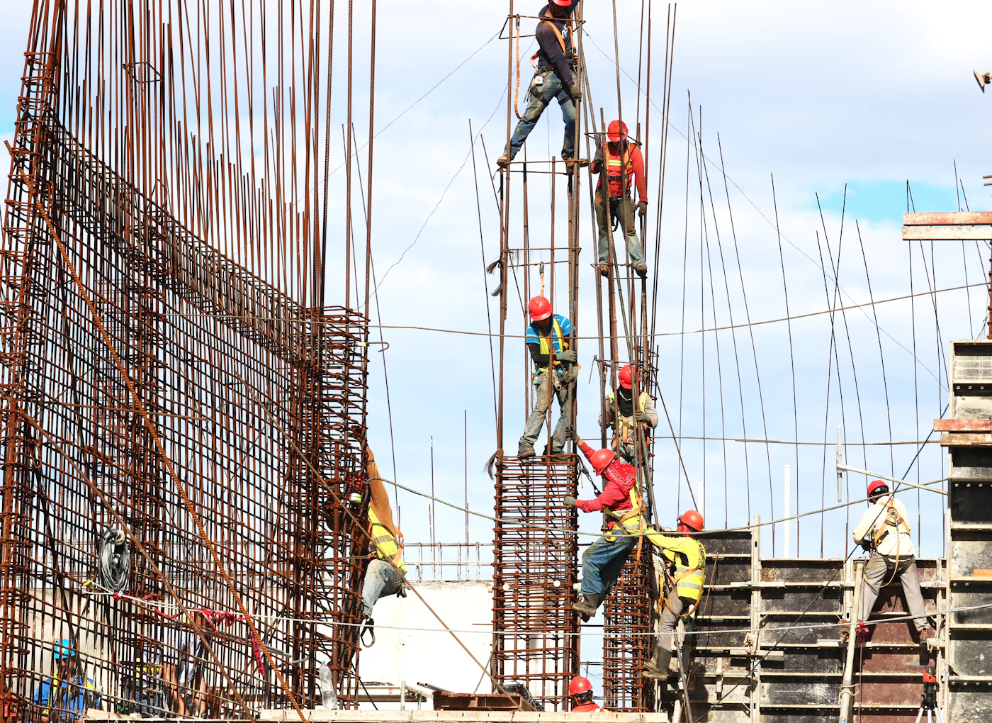 Construction crew working on reinforced concrete