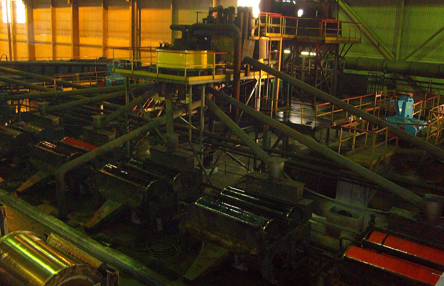 Rows of drum magnetic separators in an iron ore processing plant